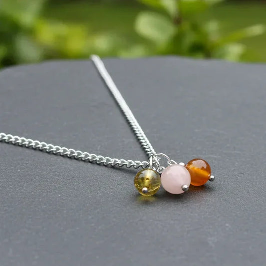 Collier 3 perles : Ambre, Pierre de Lune pêche et Cornaline
