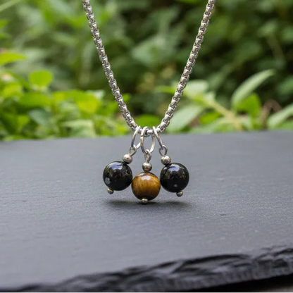 Collier 3 perles : Obsidienne mouchetée, Œil de Tigre et Obsidienne Œil Céleste - ENAE Minéraux