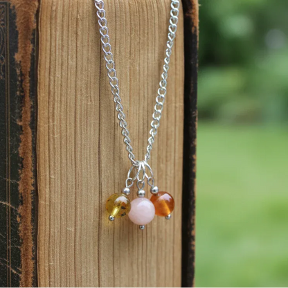 Collier 3 perles : Ambre, Pierre de Lune pêche et Cornaline - ENAE Minéraux