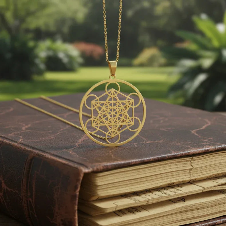 Pendentif Cube de Metatron en acier inoxydable doré