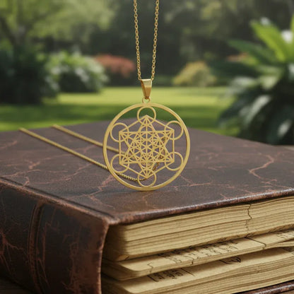Pendentif Cube de Metatron en acier inoxydable doré