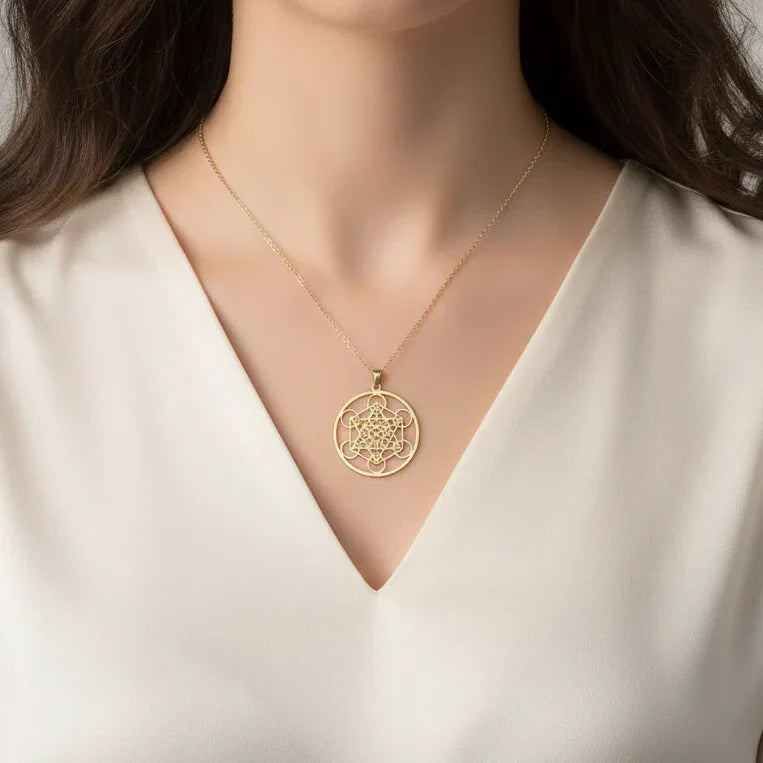 Pendentif Cube de Metatron en acier inoxydable doré